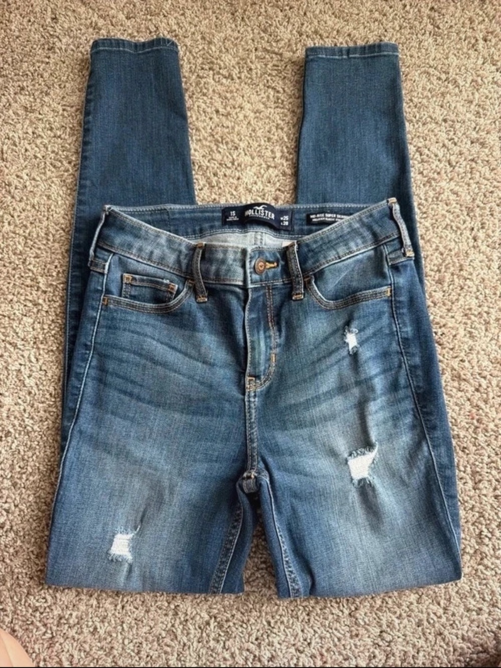 Hollister Women's Light-Mid Blue Skinny Jeans with Distressed Detail